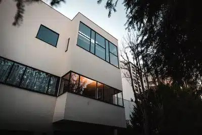 brown concrete building near trees during daytime